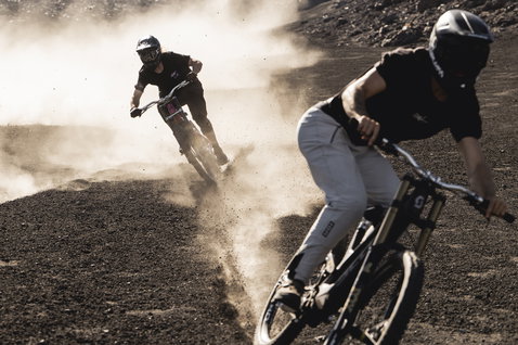 ION Ionic SS Merino men's cycling jersey in black during mountain biking on dusty volcanic trail