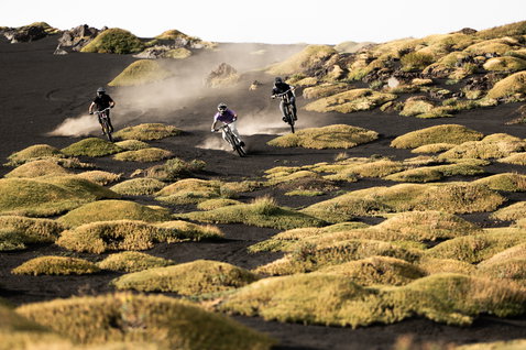 ION Bike Ionic SS DR Lyocell jersey during mountain biking on volcanic terrain in purple