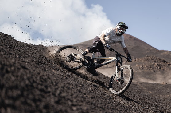 ION K-Pact Zip knee pads during mountain biking on volcanic terrain