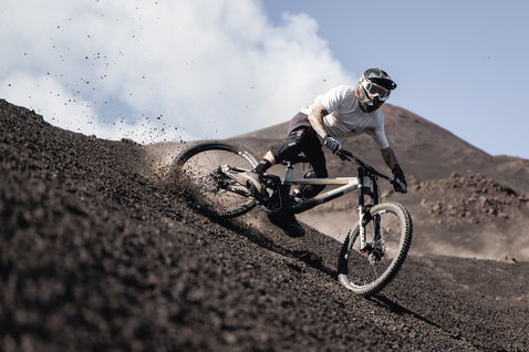 ION K-Pact Zip knee pads during mountain biking on volcanic terrain