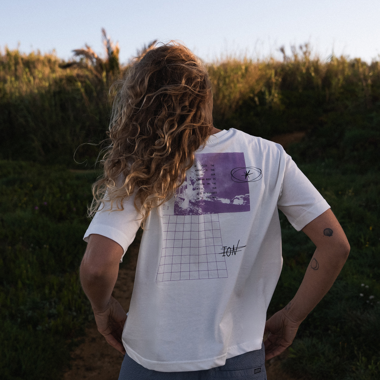 ION Vibes SS women's T-shirt in white with purple graphic back print in organic cotton