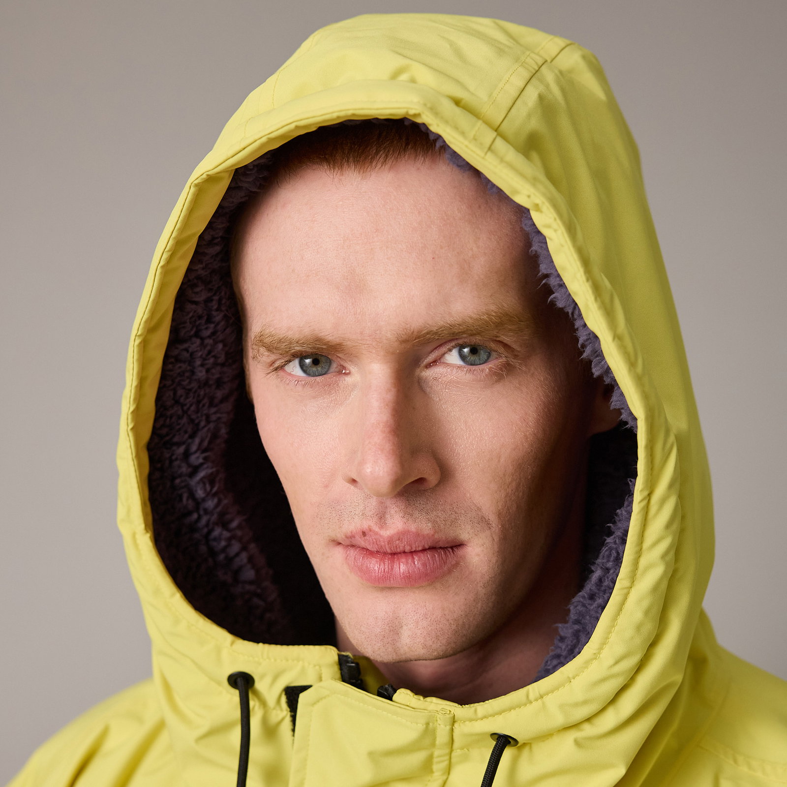ION Water Storm Coat unisex jacket with fleece-lined hood in acid yellow, detail view