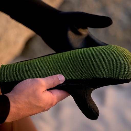 ION Arctic Mitten 5/4 neoprene winter mitten in olive green and black at the coast