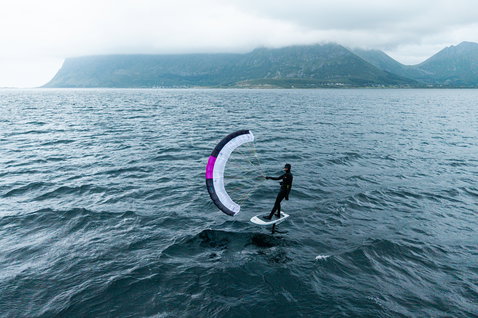 ION Jam waist harness during wing foiling on a fjord with parawing